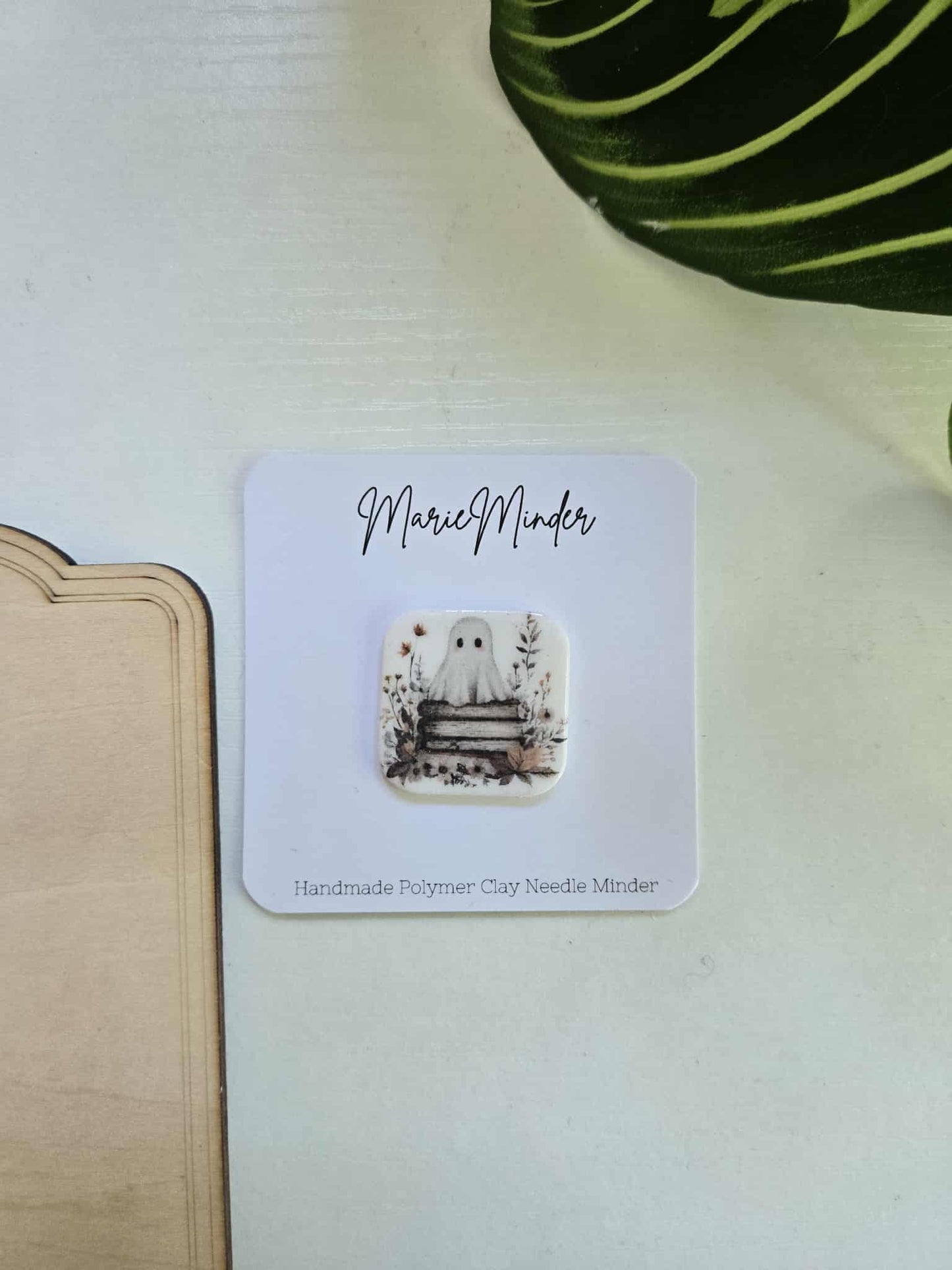 Ghost Sitting on Books Needle Minder