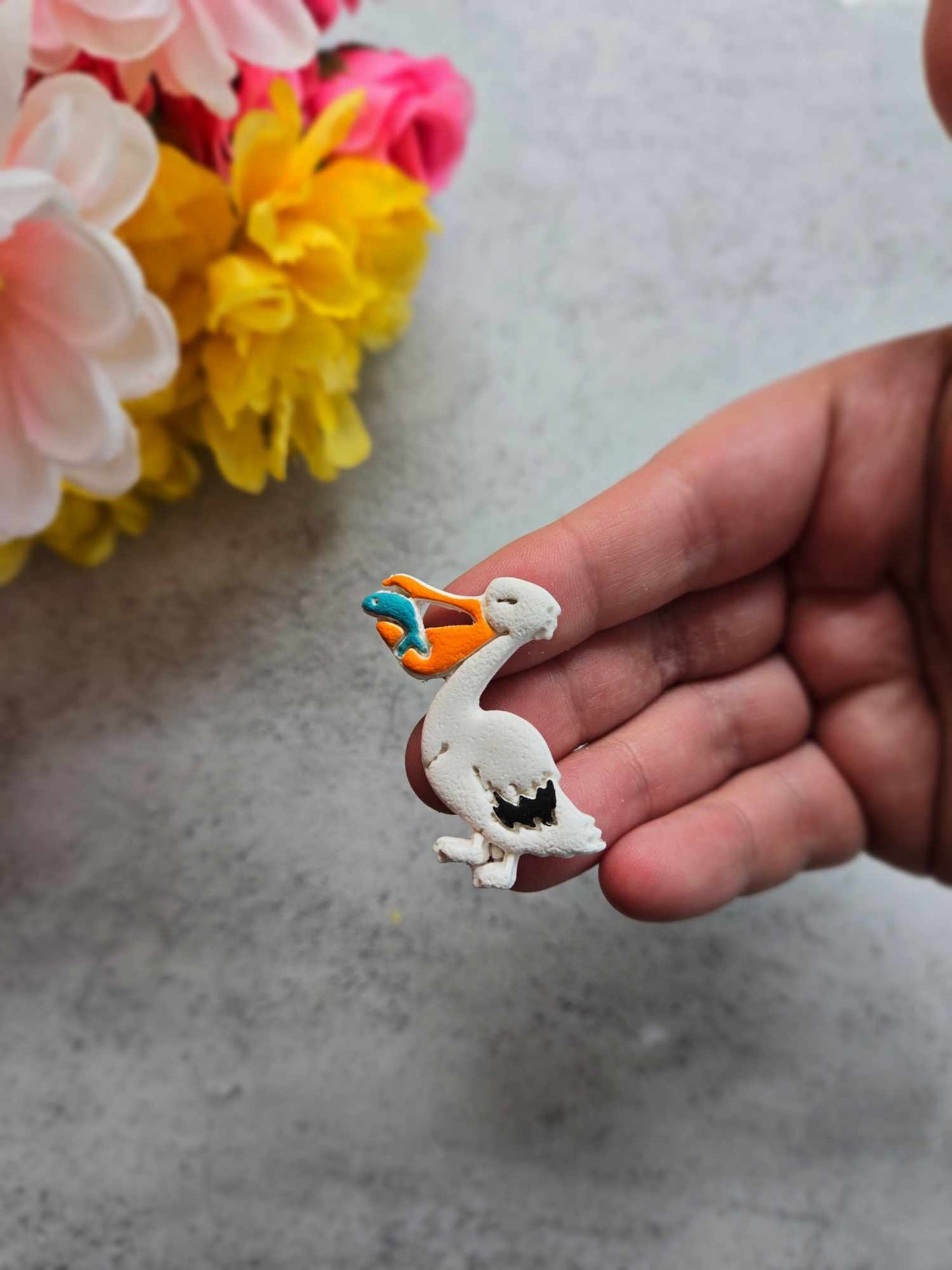 Pelican with Fish Needle Minder