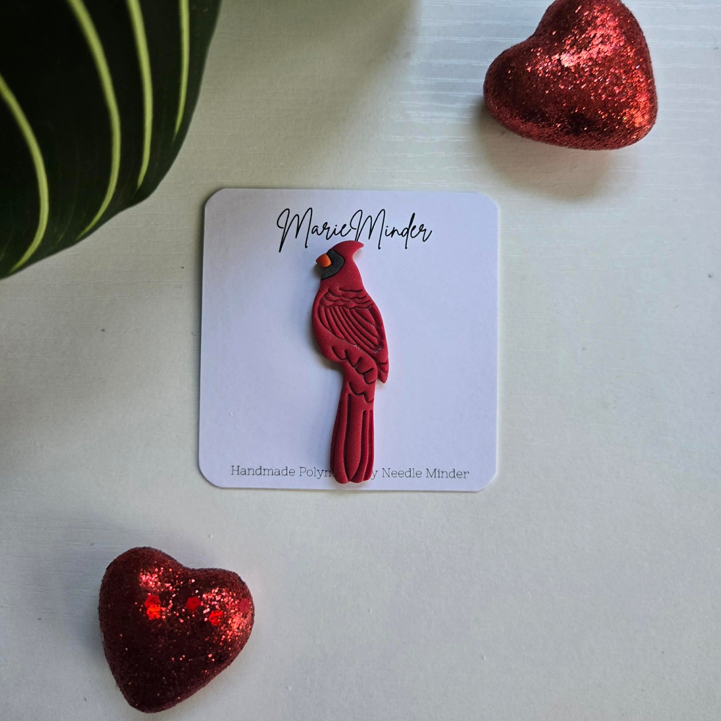 Cardinal Needle Minder