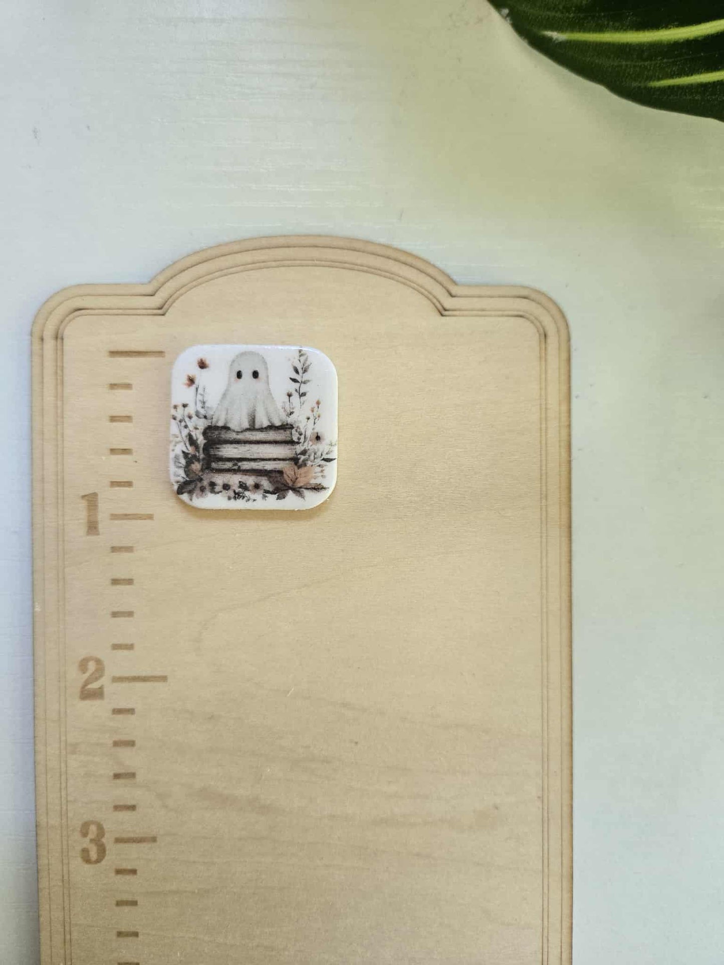 Ghost Sitting on Books Needle Minder